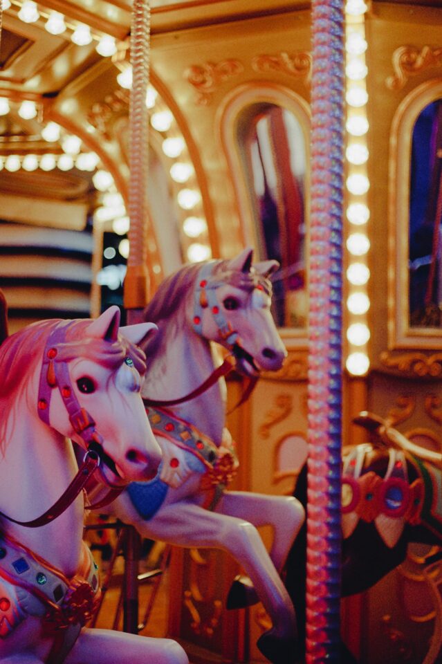 photo of a carousel horse on a merry-go-round