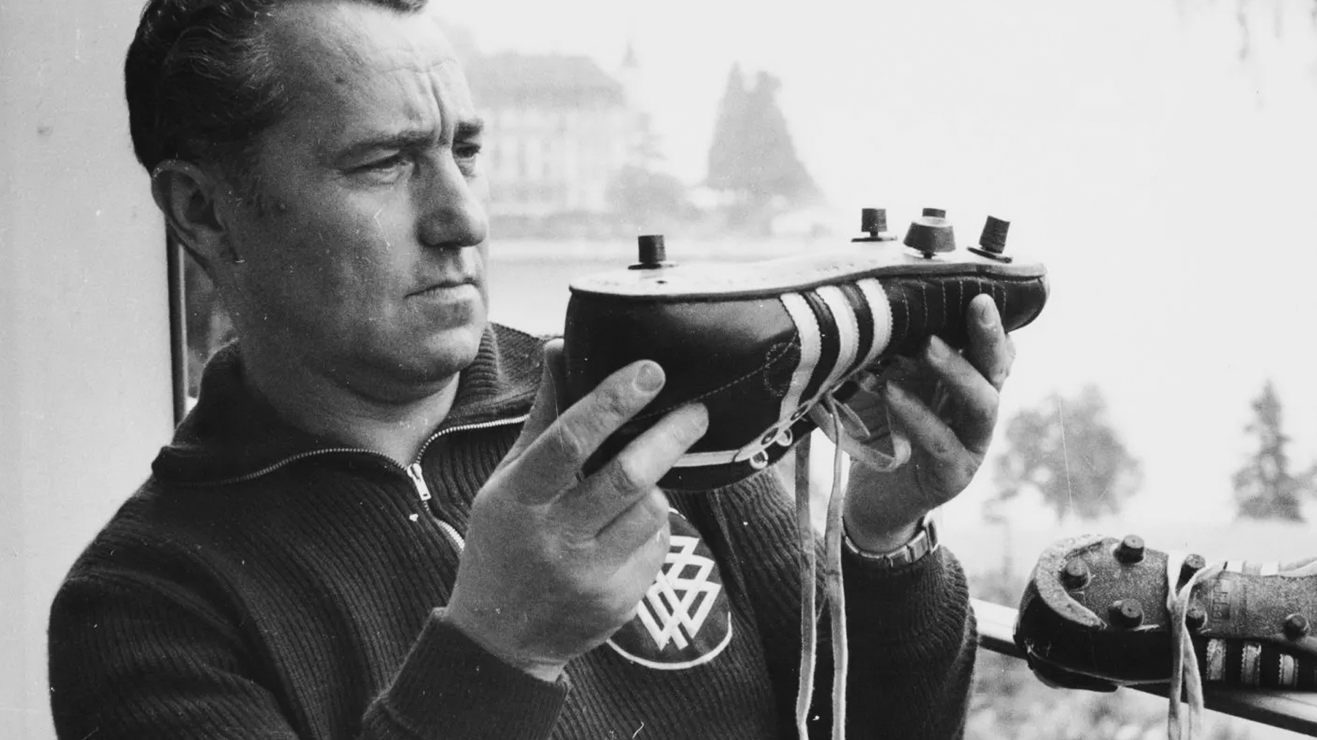 Adolf Dassler Holding Adidas Shoe