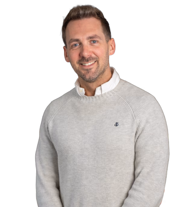 Ian standing with hands in front of body