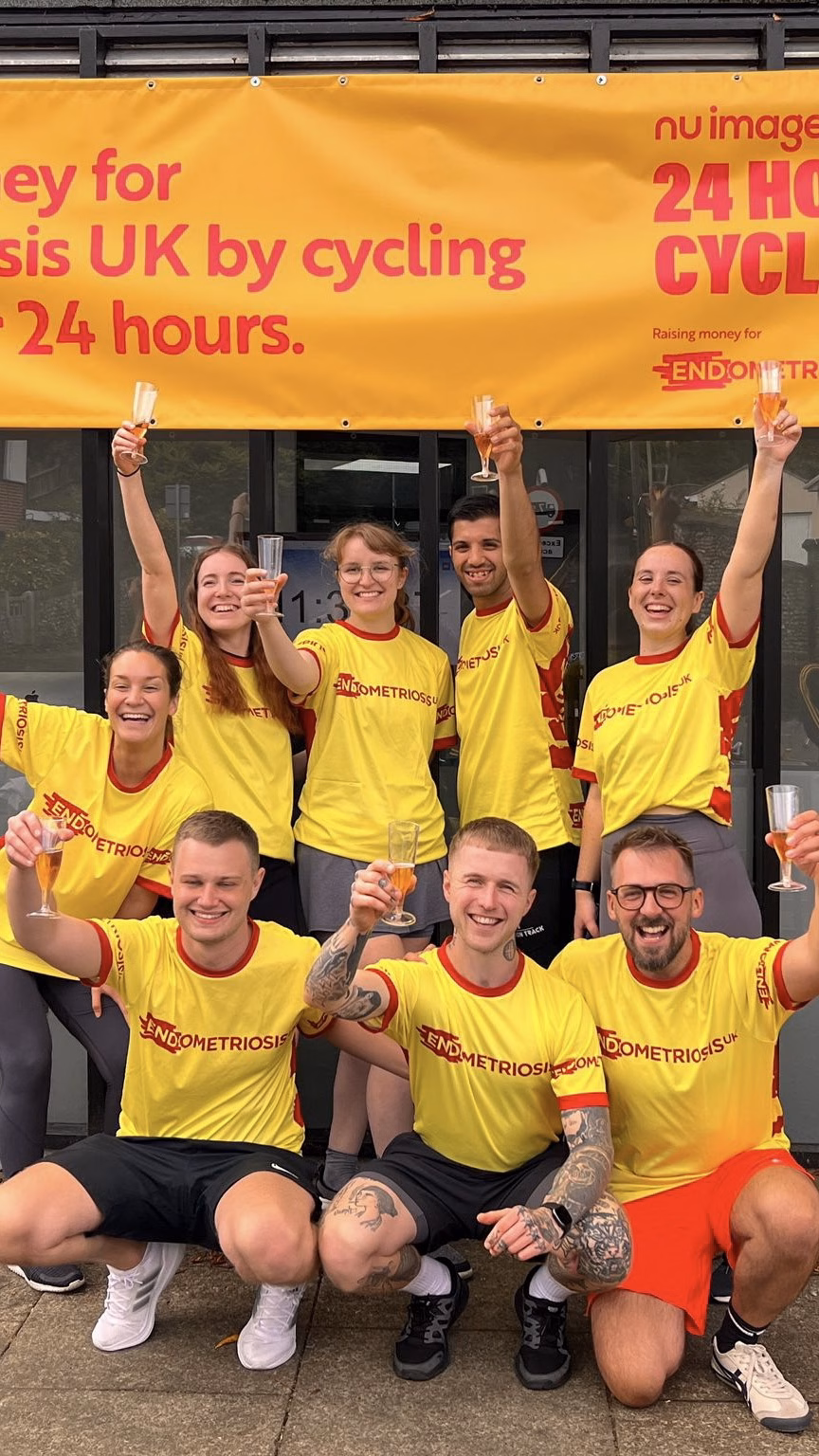 Team celebrating after cycling challenge