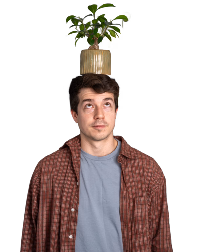 Kurt with plant on head