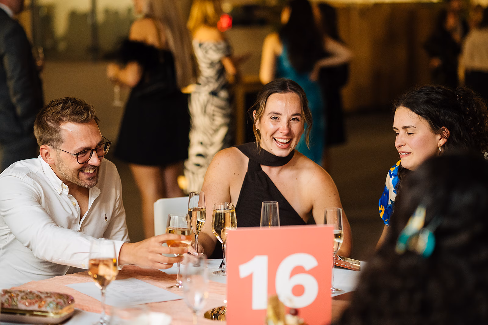 Ian, Emily and Mo smiling at awards