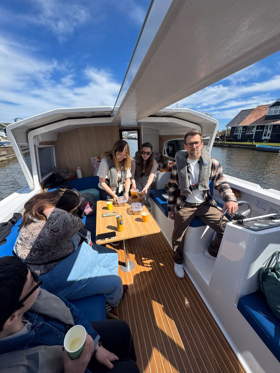 Nu Image team driving the Herbert Woods picnic boat
